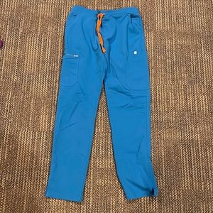 Blue figs pants (matching top on page)